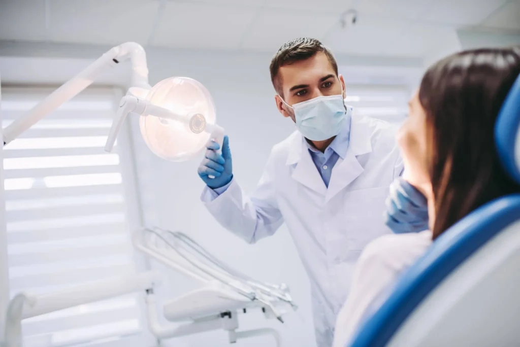 Female patient and dentist in Franklinville, NJ