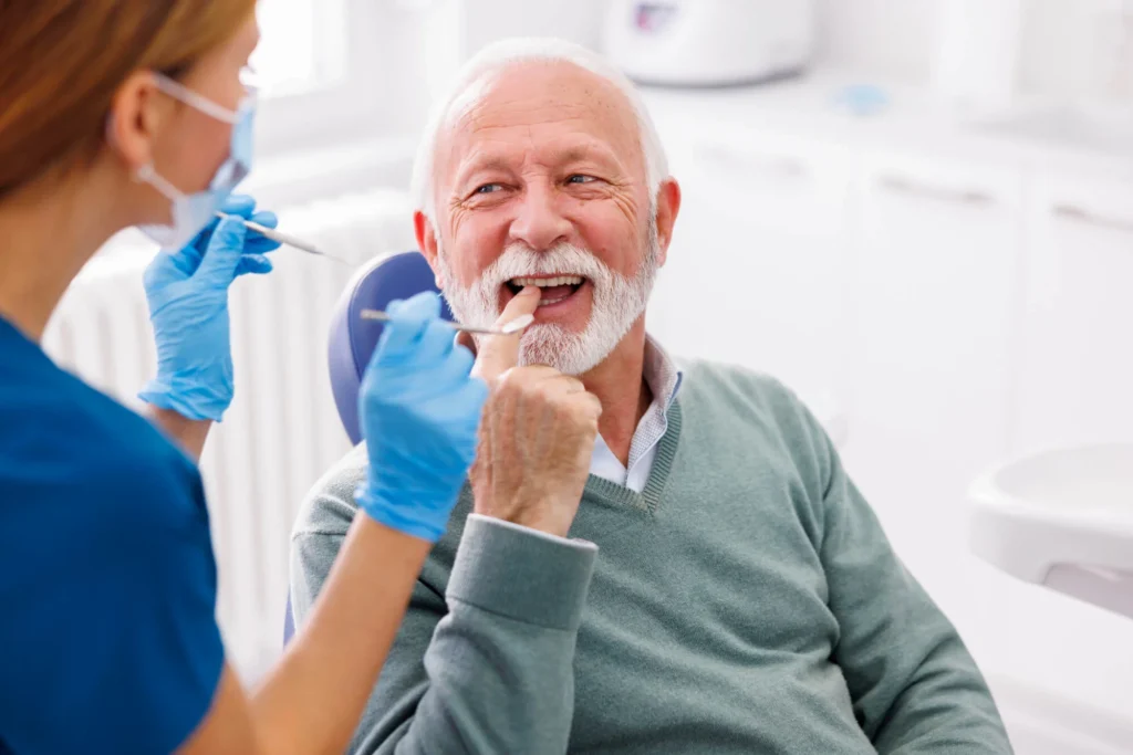 Franklinville dentist performing a dental checkup on a patient.