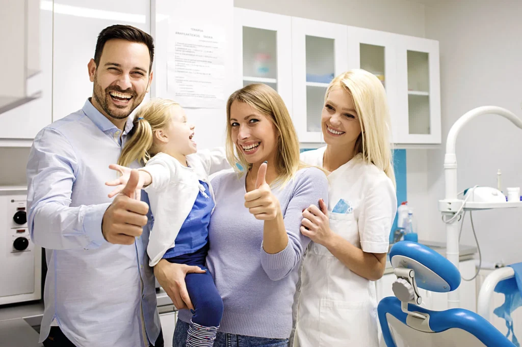 Happy family visiting general dentistry in Franklinville, NJ for routine checkup